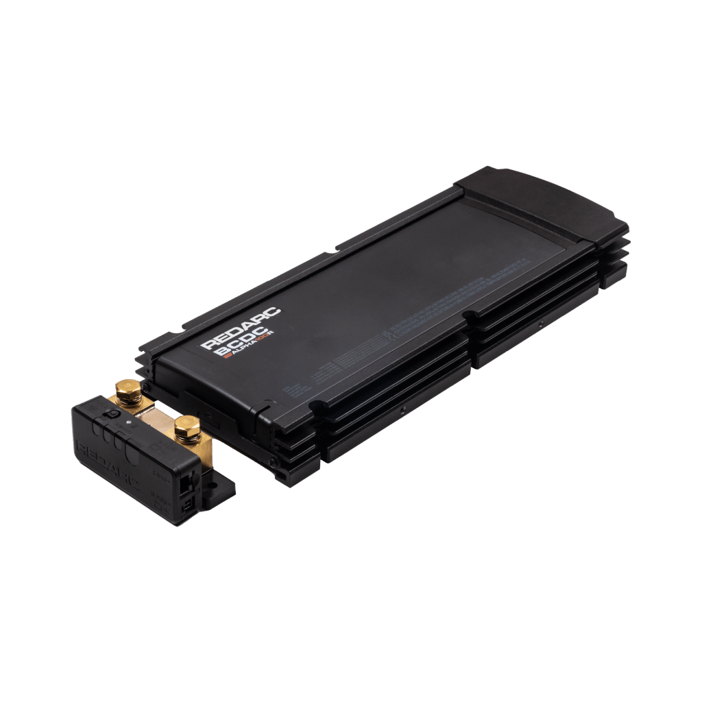 Product photo on a white background. Shows the Redarc BCDC Alpha100 R, a long thin black object with gold connections